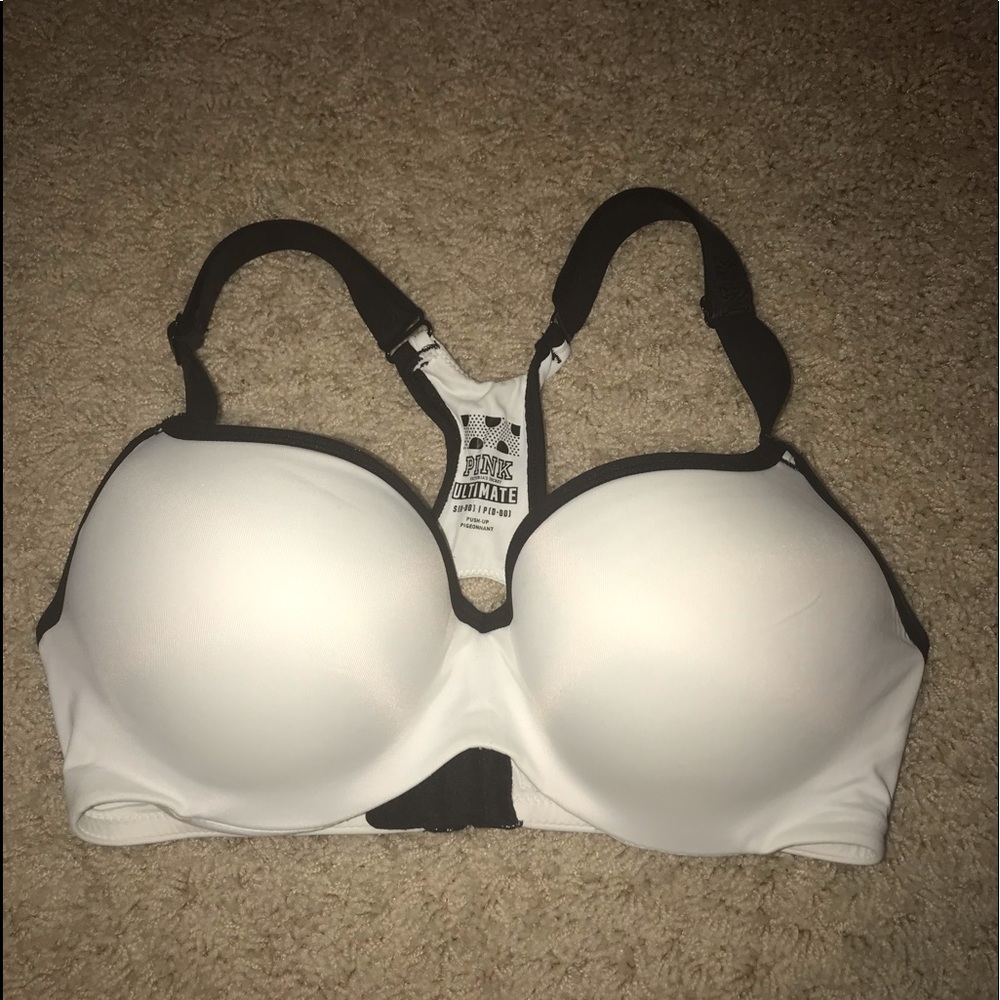 White and black padded sports bra.